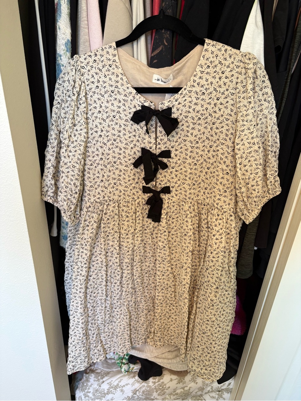 Women's Cream Floral Babydoll Top with Black Bows